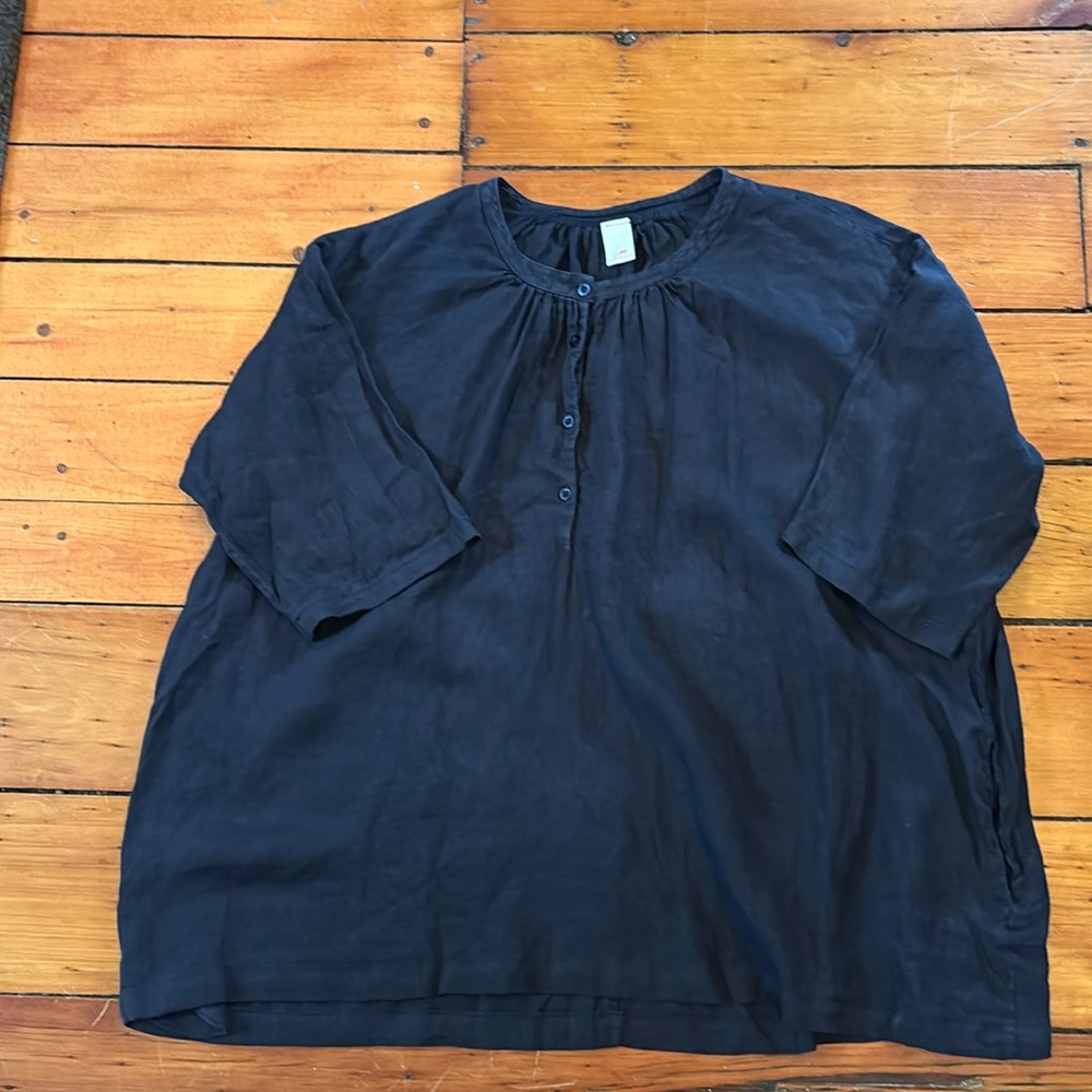 Montaigne Oversized navy blue linen tunic top with buttons and pockets.